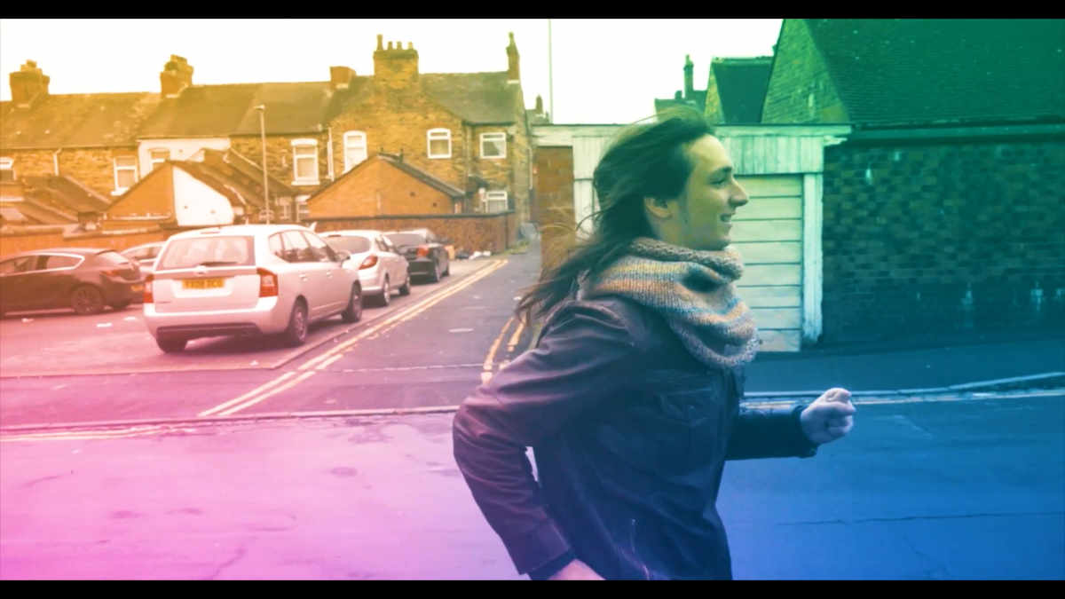 Joseph Rutland running in an urban area with colour gradient